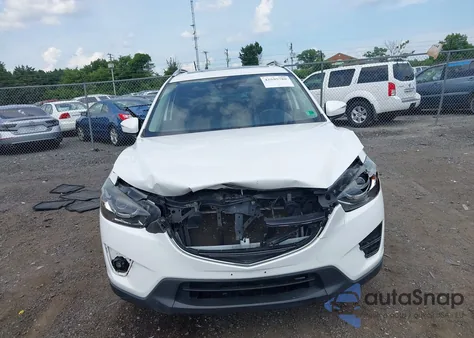 2016 Mazda Cx-5 Grand Touring z USA, uszkodzony, nr VIN JM3KE4DY5G0799129